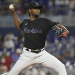 
              Miami Marlins starting pitcher Edward Cabrera aims a pitch during the first inning of the team's baseball game against the New York Mets, Friday, Sept. 9, 2022, in Miami. (AP Photo/Marta Lavandier)
            