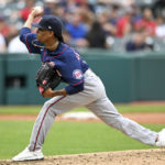 
              Minnesota Twins relief pitcher Ronny Henriquez delivers during the third inning of a baseball game against the Cleveland Guardians, Monday, Sept. 19, 2022, in Cleveland. (AP Photo/Nick Cammett)
            