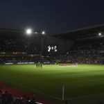 
              Players stand on the center of the pitch during a moment of silence tribute to Queen Elizabeth II before the English Premier League soccer match between Aston Villa and Southampton at Villa Park in Birmingham, England, Friday, Sept. 16, 2022. (AP Photo/Rui Vieira)
            