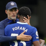 
              FILE - Chelsea's head coach Thomas Tuchel, left, hugs Chelsea's Wesley Fofana during the English Premier League soccer match between Chelsea and West Ham United at Stamford Bridge Stadium in London, on Sept. 3, 2022. Thomas Tuchel has been fired by Chelsea only one month into the season. The decision by Chelsea’s new ownership comes a day after the team lost to Dinamo Zagreb 1-0 in its first group match in the Champions League. Chelsea has lost two of its first six games in the Premier League. (AP Photo/Kirsty Wigglesworth)
            