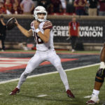 
              Florida State quarterback Tate Rodemaker (18) looks for a receiver during the second half of the team's NCAA college football game against Louisville in Louisville, Ky., Friday, Sept. 16, 2022. Florida State won 35-31. (AP Photo/Timothy D. Easley)
            