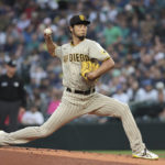 
              San Diego Padres starting pitcher Yu Darvish throws to a Seattle Mariners batter during the first inning of a baseball game Tuesday, Sept. 13, 2022, in Seattle. (AP Photo/Jason Redmond)
            