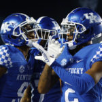 
              Kentucky wide receiver Tayvion Robinson (9) celebrates with wide receiver Barion Brown (2) after scoring a touchdown against Northern Illinois during the second half of an NCAA college football game in Lexington, Ky., Saturday, Sept. 24, 2022. (AP Photo/Michael Clubb)
            
