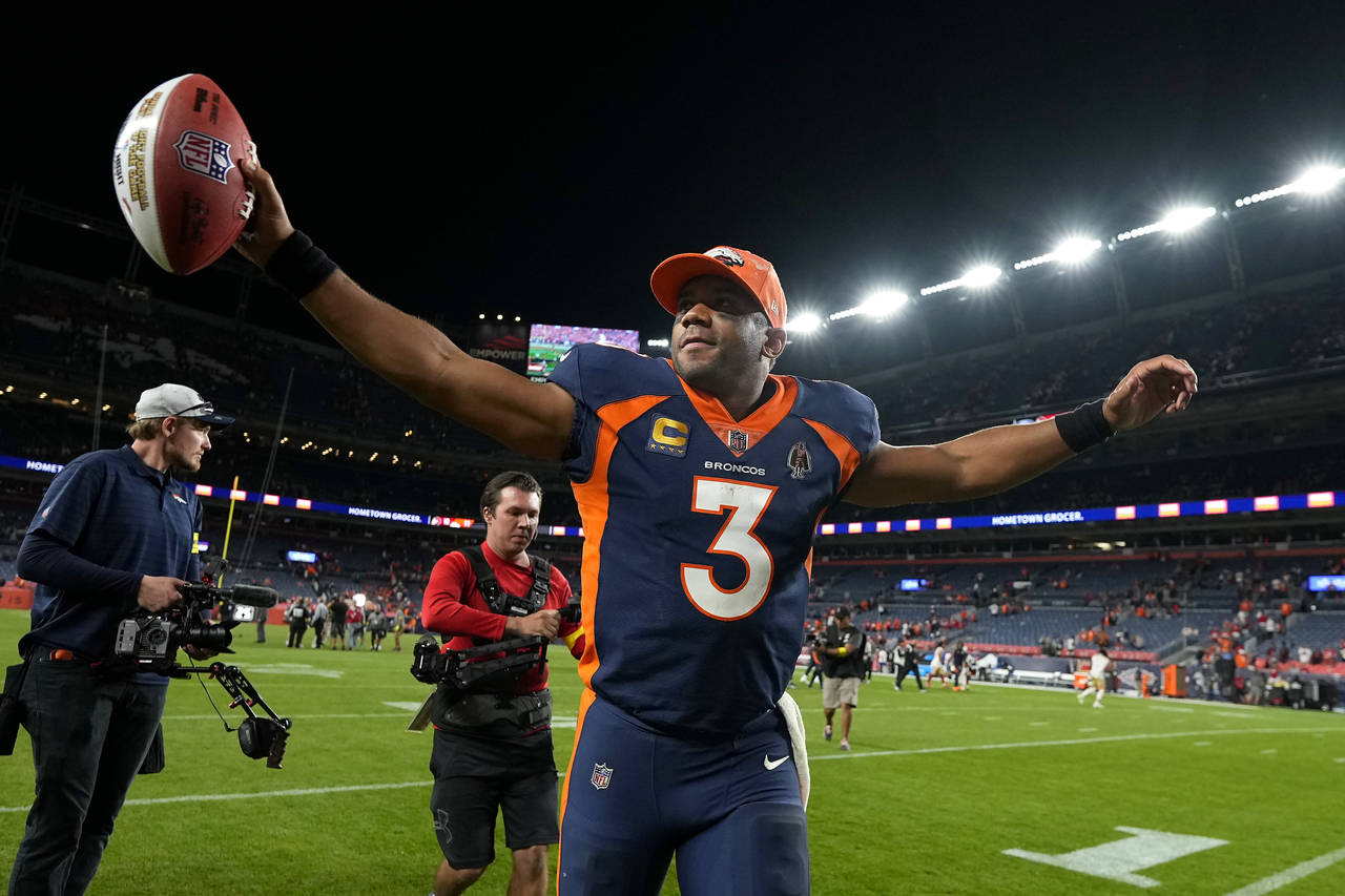 Denver Broncos quarterback Russell Wilson (3) celebrates after the Broncos defeated the San Francis...
