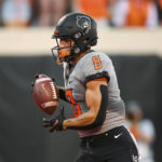 
              Oklahoma State wide receiver Braydon Johnson (8) runs for a touchdown during the first half of an NCAA college football game against Arkansas-Pine Bluff, Saturday, Sept. 17, 2022, in Stillwater, Okla. (AP Photo/Brody Schmidt)
            
