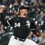 
              Chicago White Sox starting pitcher Michael Kopech delivers during the first inning of the team's baseball game against the Colorado Rockies on Tuesday, Sept. 13, 2022, in Chicago. (AP Photo/Charles Rex Arbogast)
            