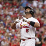 
              St. Louis Cardinals' Albert Pujols celebrates after hitting a two-run home run during the eighth inning of a baseball game against the Chicago Cubs Sunday, Sept. 4, 2022, in St. Louis. (AP Photo/Jeff Roberson)
            