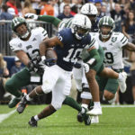 
              Penn State running back Nicholas Singleton (10) scores on a 70-yard touchdown run against Ohio in the first half of an NCAA college football game, Saturday, Sept. 10, 2022, in State College, Pa. (AP Photo/Barry Reeger)
            