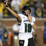 
              Hawaii Warriors quarterback Joey Yellen throws against Michigan during the first half of an NCAA college football game, Saturday, Sept. 10, 2022, in Ann Arbor, Mich. (AP Photo/Jose Juarez)
            