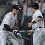 
              New York Yankees' Harrison Bader celebrates Aaron Judge after scoring against the Pittsburgh Pirates during the fifth inning of a baseball game Tuesday, Sept. 20, 2022, in New York. (AP Photo/Jessie Alcheh)
            