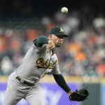 
              Oakland Athletics starting pitcher James Kaprielian throws against the Houston Astros during the first inning of a baseball game Thursday, Sept. 15, 2022, in Houston. (AP Photo/David J. Phillip)
            