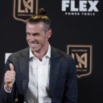
              FILE - Gareth Bale gives a thumbs-up as he is introduced as a new member of the Los Angeles FC MLS soccer club Monday, July 11, 2022, in Los Angeles.  Gareth Bale feels fitter and happier since joining MLS team Los Angeles FC and is hoping that helps his performances for Wales going into the World Cup. Bale chose to move to the United States to get the most out of the final years of his career for club and country after some tough times at Real Madrid. (AP Photo/Marcio Jose Sanchez, File)
            