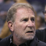 
              FILE - Phoenix Suns owner Robert Sarver watches the team play against the Memphis Grizzlies during the second half of an NBA basketball game in Phoenix, Dec. 11, 2019. The NBA has suspended Phoenix Suns and Phoenix Mercury owner Robert Sarver for one year, plus fined him $10 million, after an investigation found that he had engaged in what the league called “workplace misconduct and organizational deficiencies." The findings of the league's report, published Tuesday, Sept. 13, 2022, came nearly a year after the NBA asked a law firm to investigate allegations that Sarver had a history of racist, misogynistic and hostile incidents over his nearly two-decade tenure overseeing the franchise. (AP Photo/Ross D. Franklin, File)
            