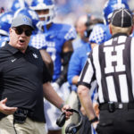 
              Kentucky head coach Mark Stoops talks with an official during the first half of an NCAA college football game against Youngstown State in Lexington, Ky., Saturday, Sept. 17, 2022. (AP Photo/Michael Clubb)
            