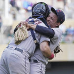 
              Cleveland Guardians pitcher James Karinchak, right, and catcher Austin Hedges celebrate after they defeated the Minnesota Twins in a baseball game, Sunday, Sept 11, 2022, in Minneapolis. (AP Photo/Jim Mone)
            