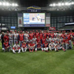 
              Members of the St. Louis Cardinals gather on the field for a photo after defeating the Milwaukee Brewers in a baseball game to win the National League Central title Tuesday, Sept. 27, 2022, in Milwaukee. (AP Photo/Morry Gash)
            