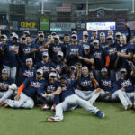 
              The Houston Astros pose for a photo after clinching the American League West title with a win over the Tampa Bay Rays during a baseball game Monday, Sept. 19, 2022, in St. Petersburg, Fla. (AP Photo/Chris O'Meara)
            