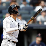 
              New York Yankees shortstop Marwin Gonzalez (14) follows through on a home run against the Minnesota Twins during the third inning of a baseball game Monday, Sept. 5, 2022, in New York. (AP Photo/Noah K. Murray)
            