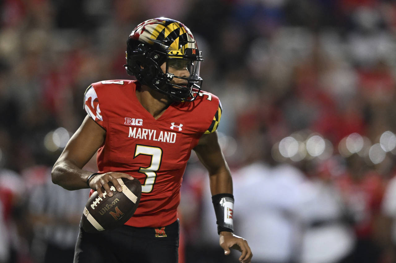 Maryland quarterback Taulia Tagovailoa looks to pass against Southern Methodist in the first half o...