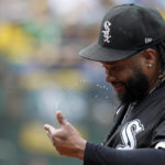 
              Chicago White Sox starting pitcher Johnny Cueto wipes his face after being pulled from a baseball game against the Oakland Athletics during the fifth inning in Oakland, Calif., Sunday, Sept. 11, 2022. (AP Photo/Godofredo A. Vásquez)
            