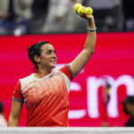 
              Ons Jabeur, of Tunisia, acknowledges the crowd after defeating Caroline Garcia, of France, in the semifinals of the U.S. Open tennis championships on Thursday, Sept. 8, 2022, in New York.(AP Photo/Charles Krupa)
            