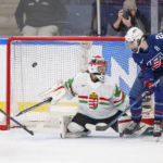 
              Goalkeeper Aniko Nemeth of Hungary in action with Hilary Knight of the United States during The IIHF World Championship Woman's ice hockey match between The United States and Hungary in Herning, Denmark, Thursday, Sept. 1, 2022. (Bo Amstrup/Ritzau Scanpix via AP)
            