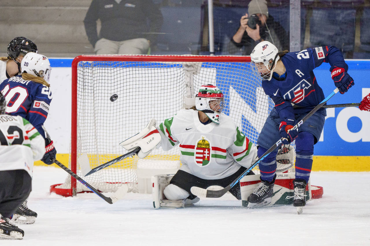 Goalkeeper Aniko Nemeth of Hungary in action with Hilary Knight of the United States during The IIH...
