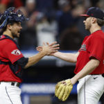 
              Cleveland Guardians catcher Luke Maile, left, and relief pitcher Trevor Stephan celebrate the team's 2-1 win against the Tampa Bay Rays in a baseball game Thursday, Sept. 29, 2022, in Cleveland. (AP Photo/Ron Schwane)
            