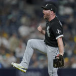 
              Chicago White Sox relief pitcher Liam Hendriks celebrates after the White Sox defeated the San Diego Padres 3-1 in a baseball game Friday, Sept. 30, 2022, in San Diego. (AP Photo/Gregory Bull)
            