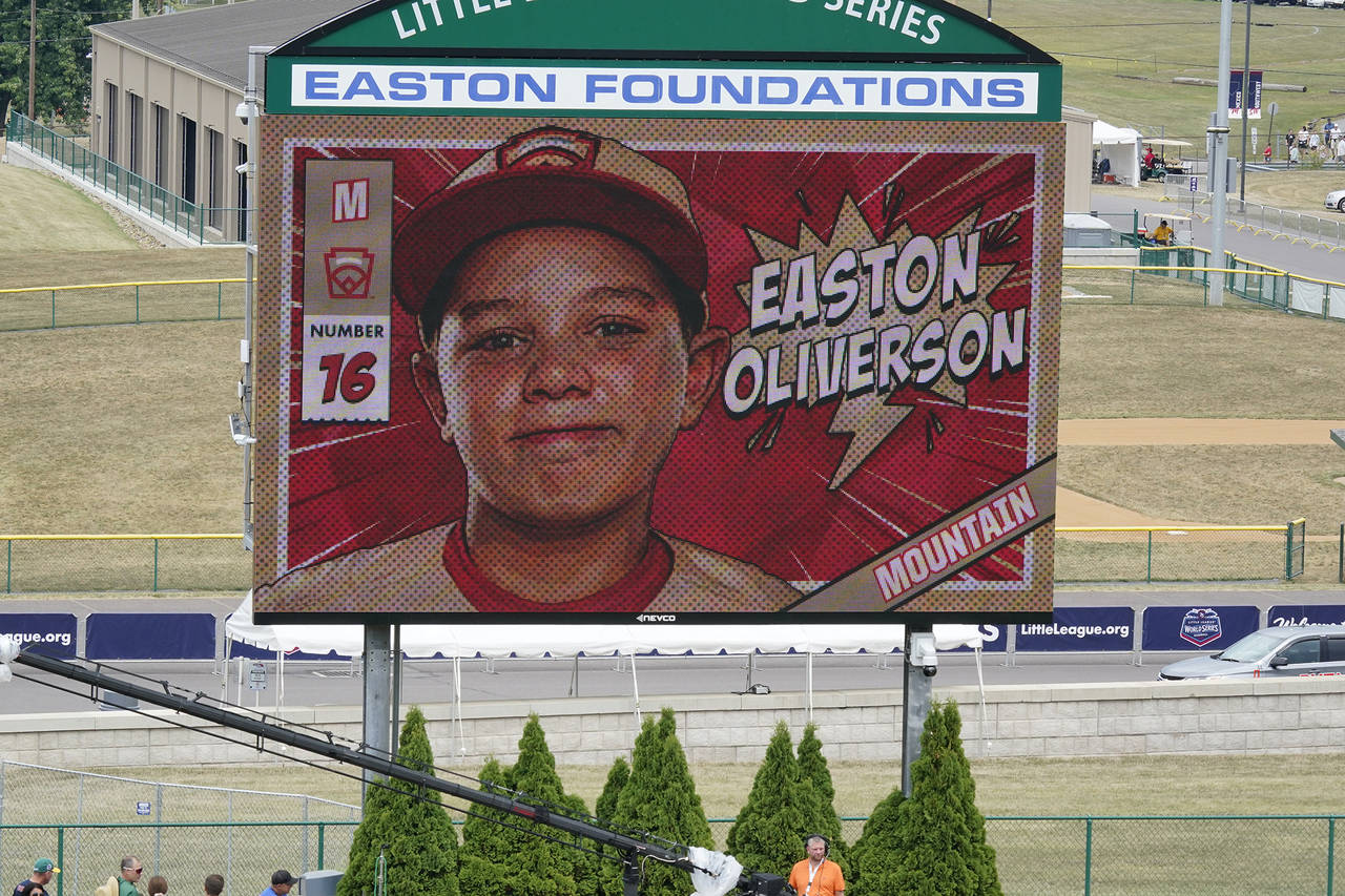 FILE- An image of Mountain Region Champion Little League team member Easton Oliverson is displayed ...