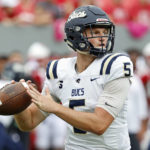
              Charleston Southern's Ross Malmgren (5) looks to throw the ball against the North Carolina State during the first half of an NCAA college football game in Raleigh, N.C., Saturday, Sept. 10, 2022. (AP Photo/Karl B DeBlaker)
            