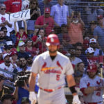 
              A fan holds a sign with the number 699 as St. Louis Cardinals' Albert Pujols gets ready to bat during the sixth inning of a baseball game against the San Diego Padres, Thursday, Sept. 22, 2022, in San Diego. (AP Photo/Gregory Bull)
            