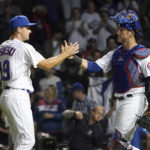 
              Chicago Cubs relief pitcher Hayden Wesneski celebrates with catcher Yan Gomes after the team's 9-3 win over the Cincinnati Reds in Wesneski's Major League debut after a baseball game Tuesday, Sept. 6, 2022, in Chicago. (AP Photo/Charles Rex Arbogast)
            