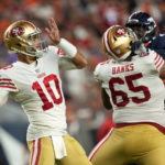 
              San Francisco 49ers quarterback Jimmy Garoppolo (10) passes against the Denver Broncos during the first half of an NFL football game in Denver, Sunday, Sept. 25, 2022. (AP Photo/Jack Dempsey)
            