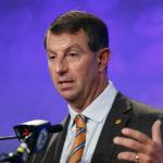 
              FILE - Clemson head coach Dabo Swinney answers a question at the NCAA college football Atlantic Coast Conference Media Days in Charlotte, N.C., Wednesday, July 20, 2022. Clemson is picked to finish back atop the ACC this upcoming season. (AP Photo/Nell Redmond, File)
            