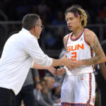 
              Connecticut Sun coach Curt Miller talks with Natisha Hiedeman during the first half of Game 5 in the team's WNBA basketball playoff semifinal against the Chicago Sky Thursday, Sept. 8, 2022, in Chicago. (AP Photo/Charles Rex Arbogast)
            