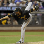 
              Pittsburgh Pirates' Yohan Ramirez throws during the seventh inning of the team's baseball game against the New York Mets on Thursday, Sept. 15, 2022, in New York. (AP Photo/Adam Hunger)
            
