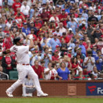 
              St. Louis Cardinals' Albert Pujols watches his two-run home run during the eighth inning of a baseball game against the Chicago Cubs Sunday, Sept. 4, 2022, in St. Louis. (AP Photo/Jeff Roberson)
            