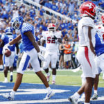 
              Kentucky wide receiver Dane Key, left, celebrates after scoring a touchdown during the first half of an NCAA college football game against Youngstown State in Lexington, Ky., Saturday, Sept. 17, 2022. (AP Photo/Michael Clubb)
            