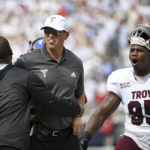 
              Troy head coach Jon Sumrall reacts after a play during the first half an NCAA college football game against Mississippi in Oxford, Miss., Saturday, Sept. 3, 2022. (AP Photo/Thomas Graning)
            