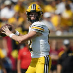 
              Missouri quarterback Brady Cook throws during the first half of an NCAA college football game against Abilene Christian Saturday, Sept. 17, 2022, in Columbia, Mo. (AP Photo/Jeff Roberson)
            