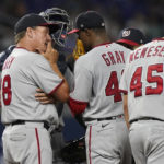 
              Washington Nationals pitching coach Jim Hickey (48) talks to Washington Nationals starting pitcher Josiah Gray (40) during the sixth inning of a baseball game against the Miami Marlins, Friday, Sept. 23, 2022, in Miami. (AP Photo/Marta Lavandier)
            
