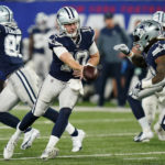 
              Dallas Cowboys quarterback Cooper Rush (10) hands off the ball to Dallas Cowboys running back Ezekiel Elliott (21) against the New York Giants during the second quarter of an NFL football game, Monday, Sept. 26, 2022, in East Rutherford, N.J. (AP Photo/Frank Franklin II)
            