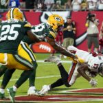 
              Tampa Bay Buccaneers' Russell Gage catches a touchdown during the second half of an NFL football game against the Green Bay Packers Sunday, Sept. 25, 2022, in Tampa, Fla. The Packers won 14-12. (AP Photo/Chris O'Meara)
            