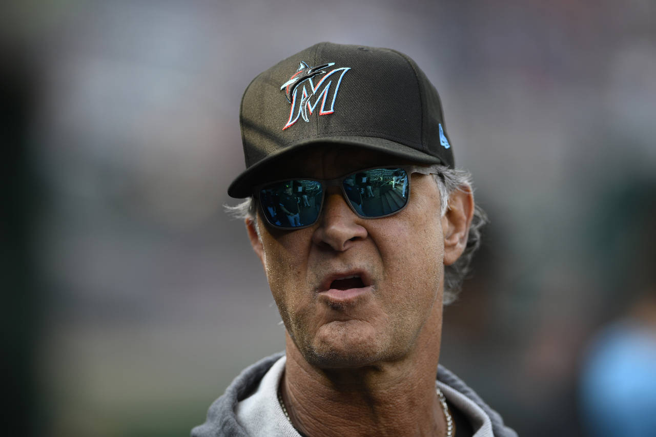 FILE - Miami Marlins manager Don Mattingly looks on before a baseball game against the Washington N...
