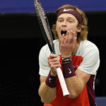 
              Andrey Rublev, of Russia, reacts after losing a point to Frances Tiafoe, of the United States, during the quarterfinals of the U.S. Open tennis championships, Wednesday, Sept. 7, 2022, in New York. (AP Photo/Seth Wenig)
            