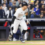 
              New York Yankees designated hitter Aaron Judge drops the bat after hitting a double against Boston Red Sox starting pitcher Brayan Bello during the first inning of a baseball game Sunday, Sept. 25, 2022, in New York. (AP Photo/Jessie Alcheh)
            