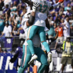 
              Miami Dolphins wide receiver Jaylen Waddle (17) celebrates after a touchdown during the second half of an NFL football game against the Baltimore Ravens, Sunday, Sept. 18, 2022, in Baltimore. (AP Photo/Nick Wass)
            