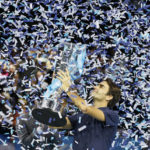
              FILE - Roger Federer of Switzerland holds up the winners trophy after he defeated Jo-Wilfried Tsonga of France in thier singles final tennis match at the ATP World Tour Finals, in the O2 arena in London, Sunday, Nov. 27, 2011. Federer announced Thursday, Sept.15, 2022 he is retiring from tennis. (AP Photo/Kirsty Wigglesworth, File)
            