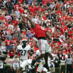 
              Georgia tight end Darnell Washington (0) can't make a catch in the end zone during the first half of an NCAA college football game against Samford Saturday, Sept. 10, 2022 in Athens, Ga. (AP Photo/John Bazemore)
            